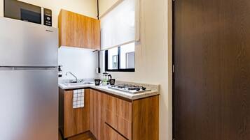 Fridge, microwave, stovetop, coffee/tea maker