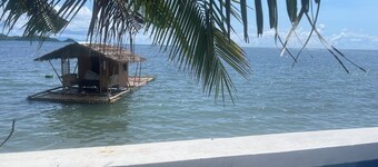 BeachFront Casa w/ 4 Cabin, Floating Cottage, Pet Friendly in Lian for 25 guests
