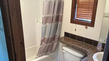 Hair dryer, towels, soap, shampoo