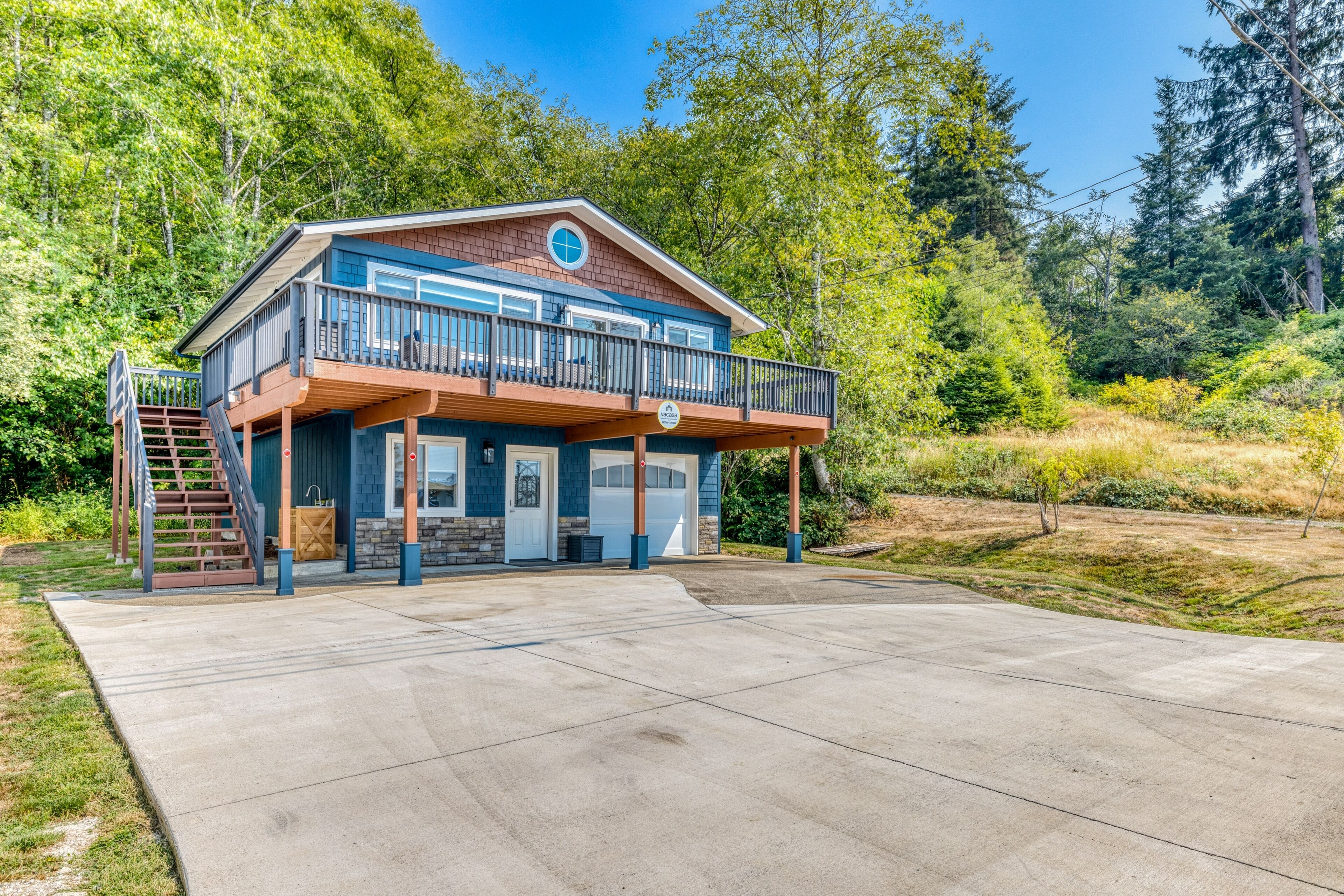 Renovated home with wood stove, water views, & expansive balcony - dog ok