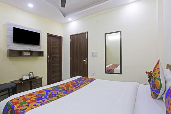 Habitación Deluxe doble | Ropa de cama de alta calidad, edredones de plumas, minibar