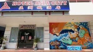 A hotel entrance with a sign reading "HOTEL ASIA CITY" and a colorful mural depicting a tiger and a dragon. - Hotel O Asia City (Kota Kinabalu)