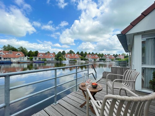 Cozy holiday home on the water with a terrace and jetty