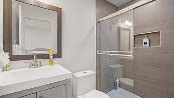 Bathtub, hair dryer, towels