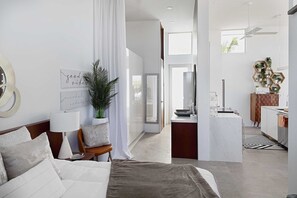 1 bedroom, desk, iron/ironing board, travel crib