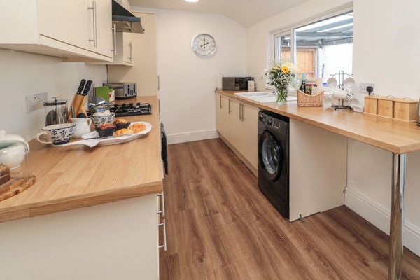 Fridge, electric kettle, toaster, cookware/dishes/utensils