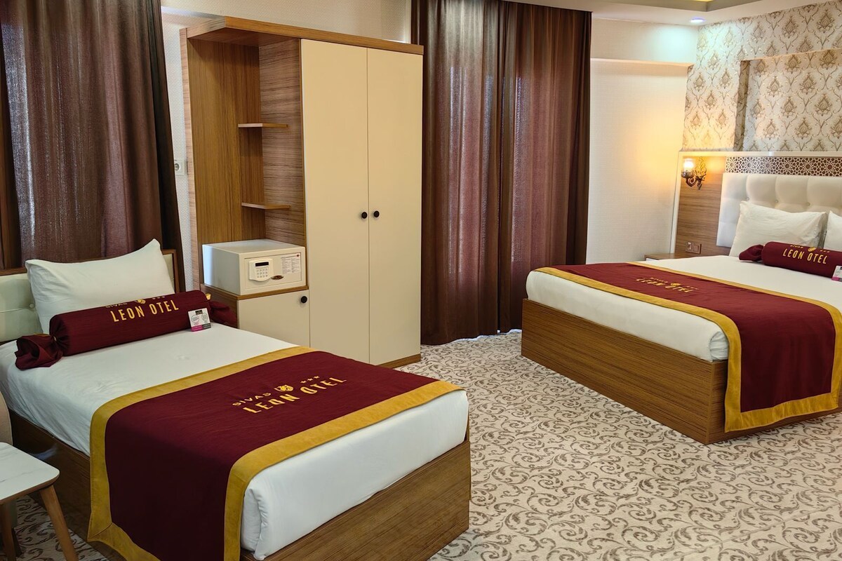 Premier-Dreibettzimmer