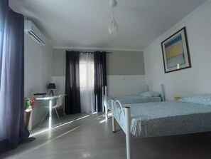 3 bedrooms, desk, iron/ironing board, travel cot