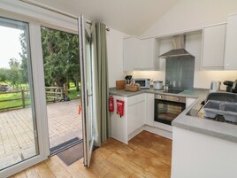 Fridge, electric kettle, toaster, cookware/dishes/utensils