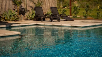 Seasonal outdoor pool, pool umbrellas, pool loungers