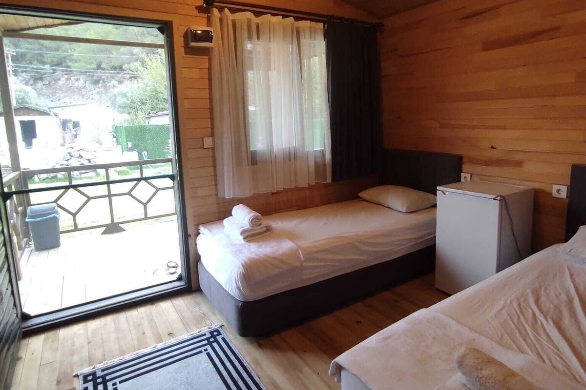 Bungalow Standar, 1 Tempat Tidur King, pemandangan kebun | Minibar, Wi-Fi gratis, dan seprai linen