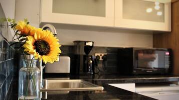 Fridge, microwave, coffee/tea maker, electric kettle