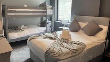 Family Room, 1 Bedroom | 1 bedroom, desk, laptop workspace, free WiFi