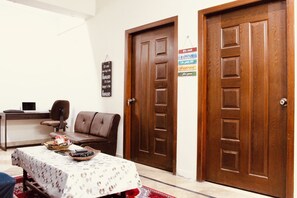 Interior - Stylish 2BR Unit: ideal retreatliving room kitchen  (Islamabad)