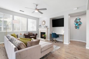 Smart TV, fireplace, books