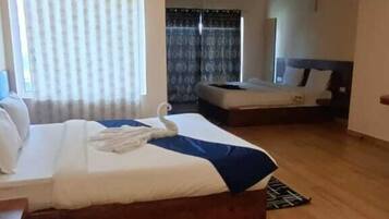 Suite Deluxe, 1 cama de matrimonio grande, vistas al mar | 1 dormitorio