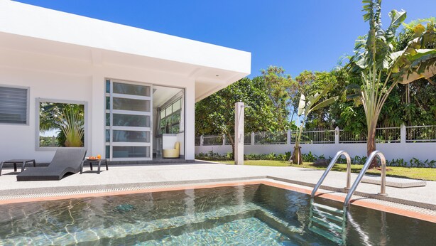 A modern house with a swimming pool, a covered patio, and a garden. - Secluded Paradise Your Exclusive Villa  (Rawai)