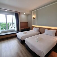 Deluxe Room, 2 Twin Beds | 1 bedroom, in-room safe, desk, blackout drapes