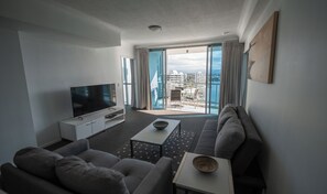 Deluxe Apartment | Living area | Flat-screen TV - Chevron Renaissance-Resort Style Living managed by Gold Coast Premium (Surfers Paradise)