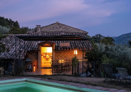 Outdoor pool. Charming Stone House set in its own olive grove, with large pool & amazing views