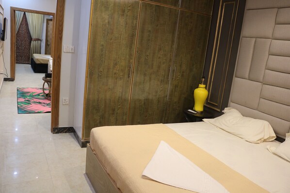 Appartement Exécutif | 3 chambres, chambres insonorisées, fer et planche à repasser