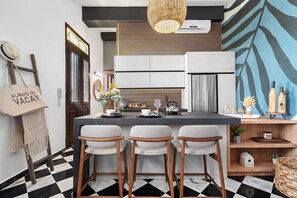 Fridge, microwave, stovetop, coffee/tea maker