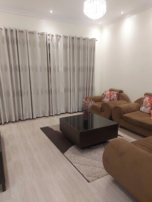 Living area - Cozy 2-bed Apartment in Akright City, Bwebajja (Entebbe)