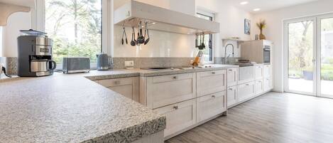 Oven, stovetop, dishwasher, coffee/tea maker