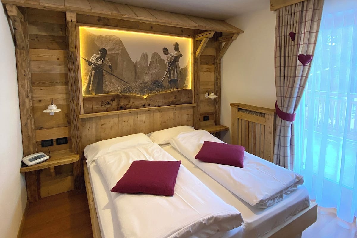 Comfort Room | 1 bedroom, down comforters, in-room safe, desk