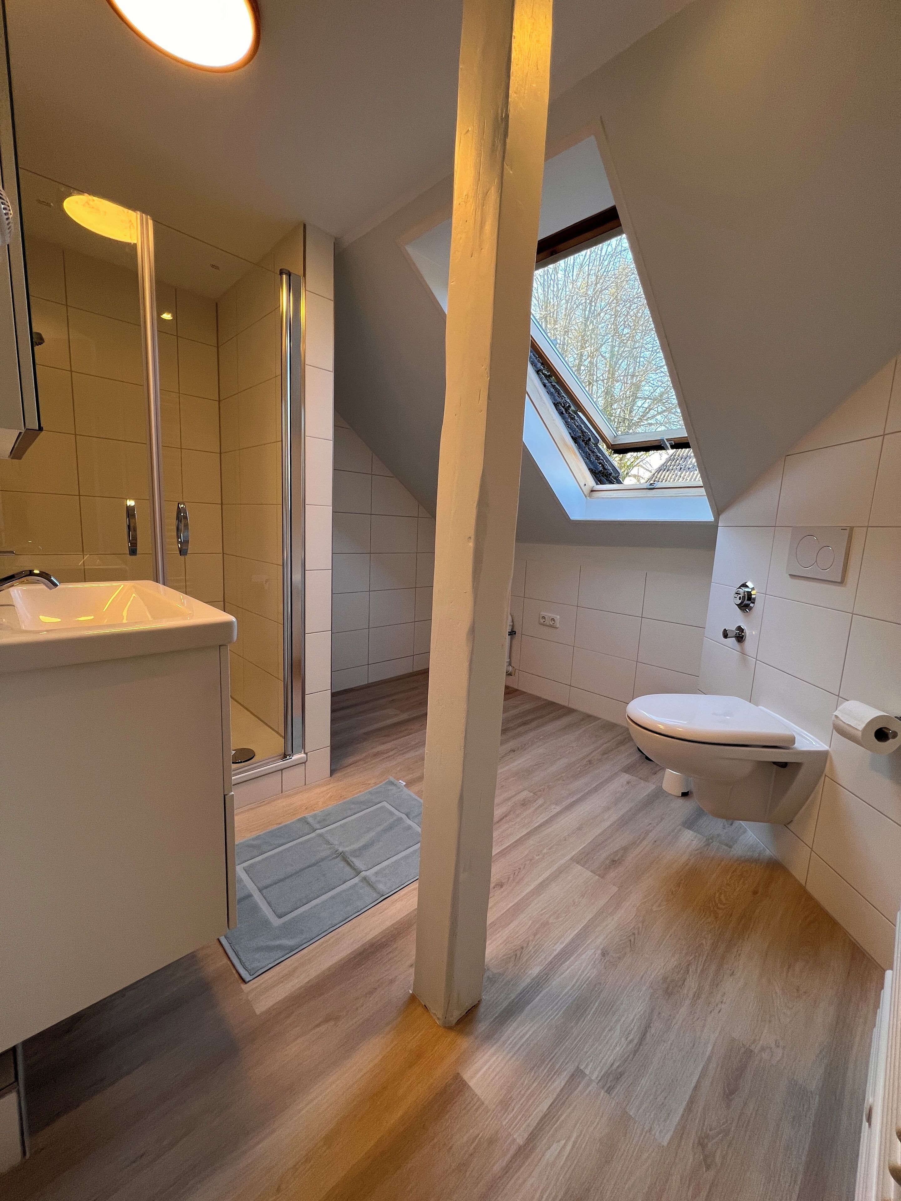 Comfort Condo | Bathroom | Shower, rainfall showerhead, hair dryer, towels