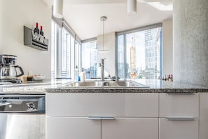 Fridge, microwave, oven, stovetop - 2BR | Gym, Pool | Bellevue | Sophari Towers M (Bellevue)