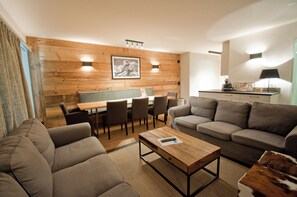 Comfort Apartment | Living area | Flat-screen TV