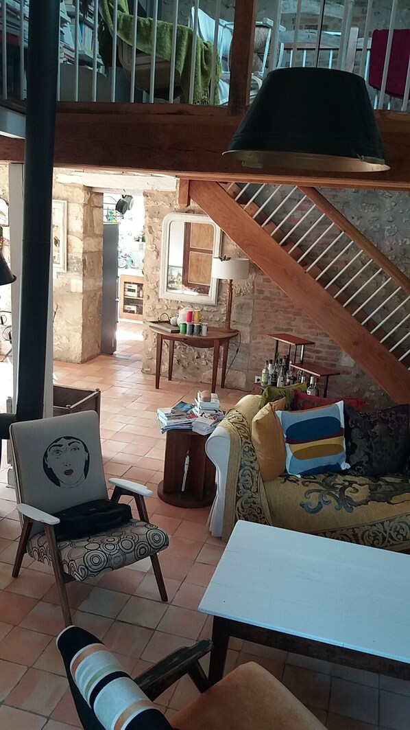 TV, fireplace, books, printers