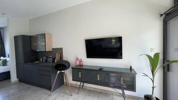 Cabin | Living area | TV, fireplace