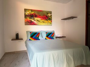 Desk, laptop workspace, free WiFi, bed sheets