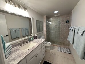 Shower, hair dryer, towels, soap
