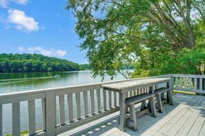 Outdoor dining - Lakefront Home: Fishing + Kayaking + King Bed + Hot Tub (Logan)