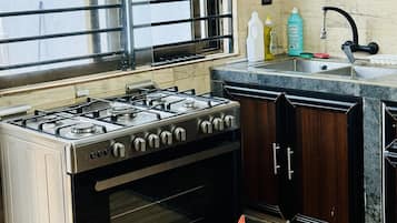 Fridge, microwave, coffee/tea maker, electric kettle