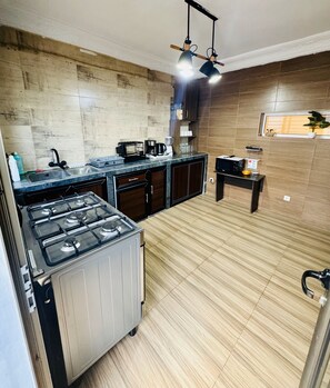Fridge, microwave, coffee/tea maker, electric kettle