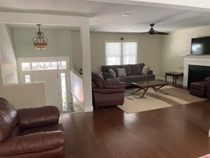 Smart TV -  Top-level of a modern split-level home. 
 (Fuquay-Varina)