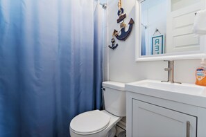 Hair dryer, towels, soap, toilet paper