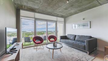 Deluxe Apartment | Living area | Smart TV