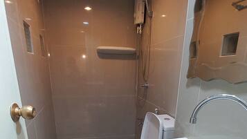 Shower, bidet, towels, soap