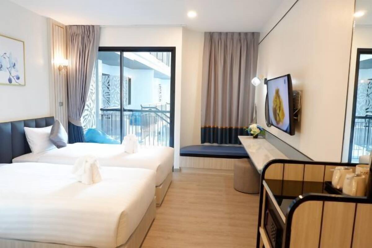 Blackout drapes, WiFi (free), bed sheets
