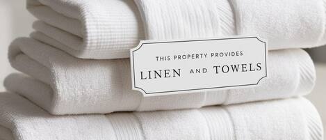 A stack of white linen and towels.