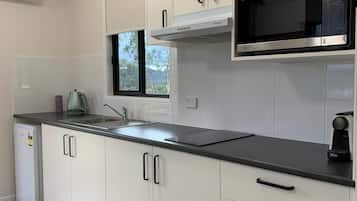 Fridge, microwave, stovetop, coffee/tea maker