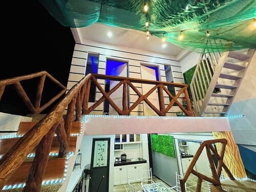 Affordable Cozy rest house with pools , free wifi and parking on site 