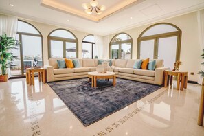 Luxury Villa | Living area | 65-inch Smart TV with cable channels, Netflix, streaming services