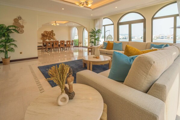 Luxury Villa | Living area | 65-inch Smart TV with cable channels, Netflix, streaming services