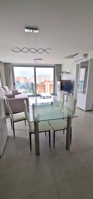 Superior Apartment | Living area | 43-inch Smart TV with satellite channels
